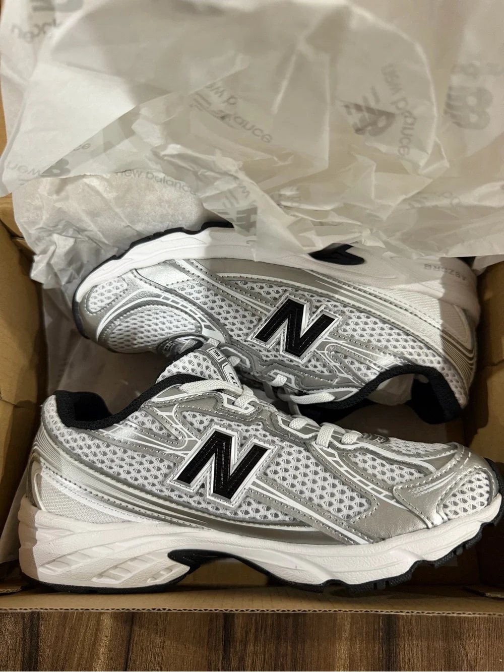 New Balance Kids Silver and White Athletic Sneakers